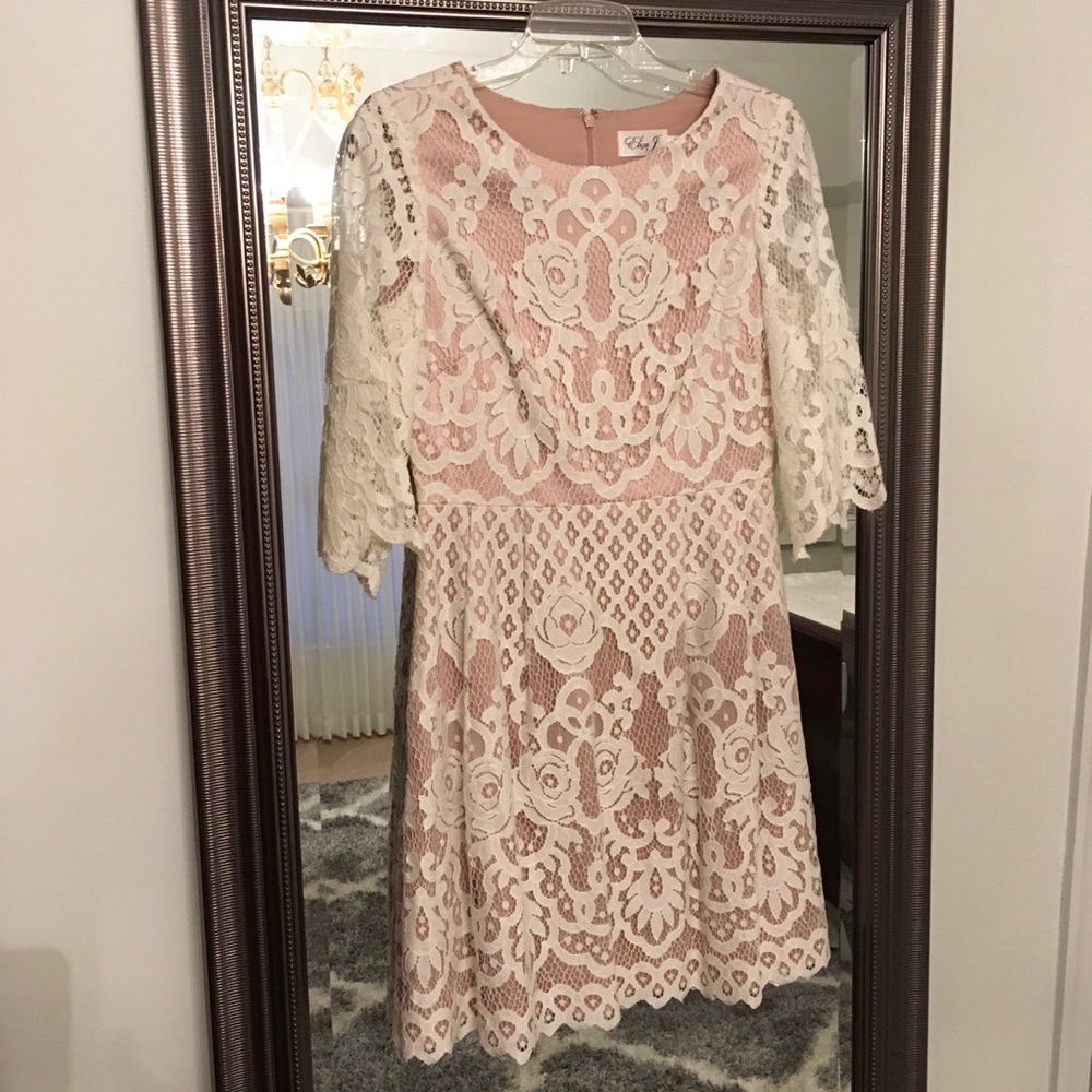 Beautiful cream and flesh under lay dress.